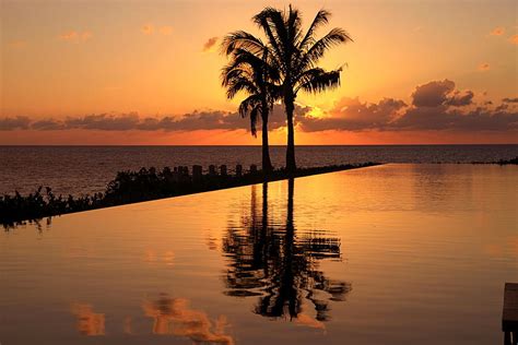 Infinity Pool At Sunset Photograph by Andrea Urlass - Fine Art America