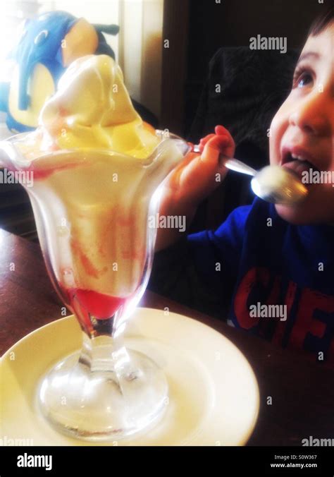 Boy ice cream sundae hi-res stock photography and images - Alamy