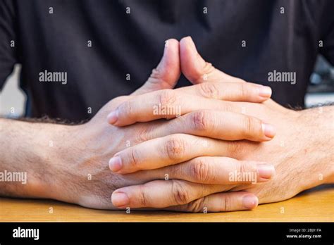 Intertwined and hands hi-res stock photography and images - Alamy