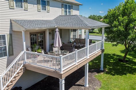 Covered porch with hip-style roof | Porch design, Covered deck designs, Patio roof