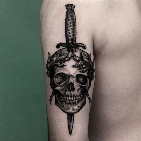 dagger and skull on backside of the upper arm from yesterday ...