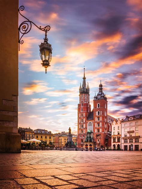 Download Krakow Old Town, Poland On A Sunset Wallpaper | Wallpapers.com