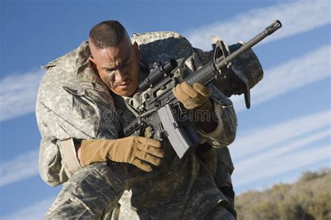 US Army Soldier Carrying Wounded Colleague Stock Photo - Image: 29659868