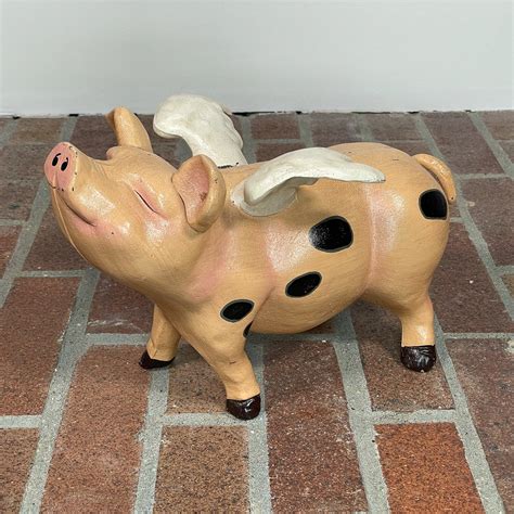 PAINTED CAST IRON FLYING PIG