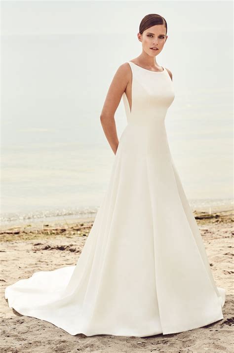 View Sleek Modern Wedding Dress - Style #2115 from Mikaella Bridal. Satin gown with bateau ...