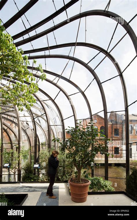 Interior view of Glass house. Bombay Sapphire Distillery, Laverstoke, United Kingdom. Architect ...