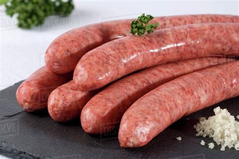 Raw pork sausages - Stock Photo - Dissolve