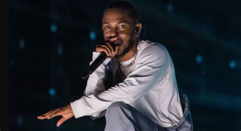 Kendrick Lamar stops white fan after she raps the N-word onstage with him: Watch - Consequence