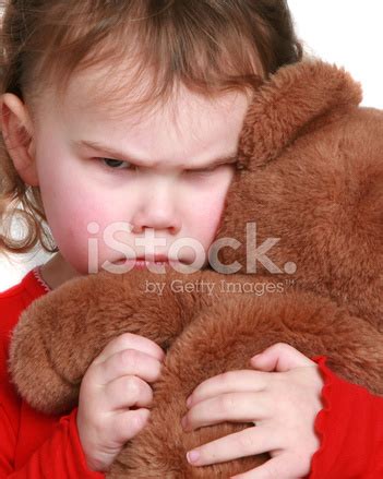 Close Up Of A Little Girl Frowning Stock Photo | Royalty-Free | FreeImages