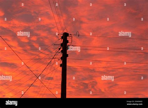 An electrical line and a power pole Stock Photo - Alamy