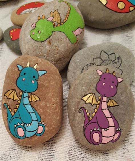 Cartoon dragons painted rocks | Painted rocks craft, Rock crafts, Painted rocks