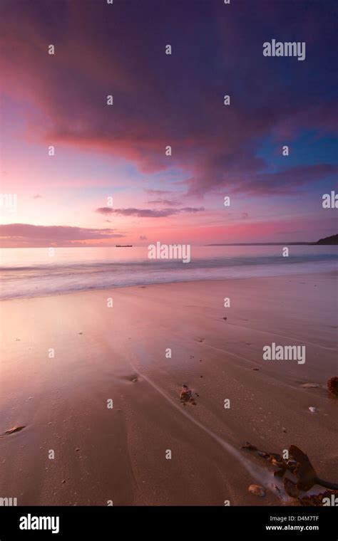 Gyllyngvase beach sunrise Stock Photo - Alamy