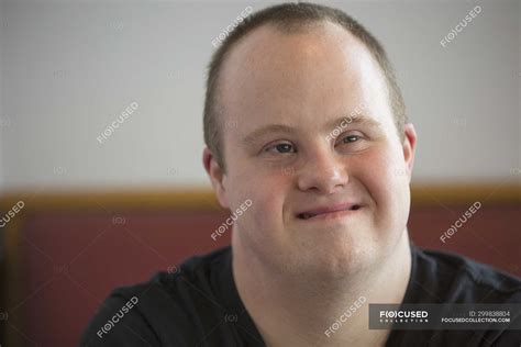 Portrait of caucasian man with Down Syndrome — medicine, cute - Stock Photo | #299838804