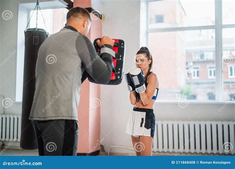 Woman Training Boxing with Personal Trainer. Instructor Teaching Female ...