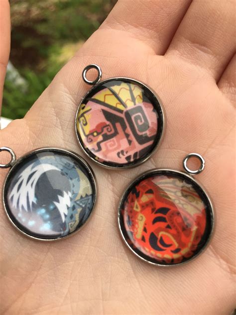 MHW Inspired Glass Pendants | Unique items products, Custom pendants, Cabochon pendant