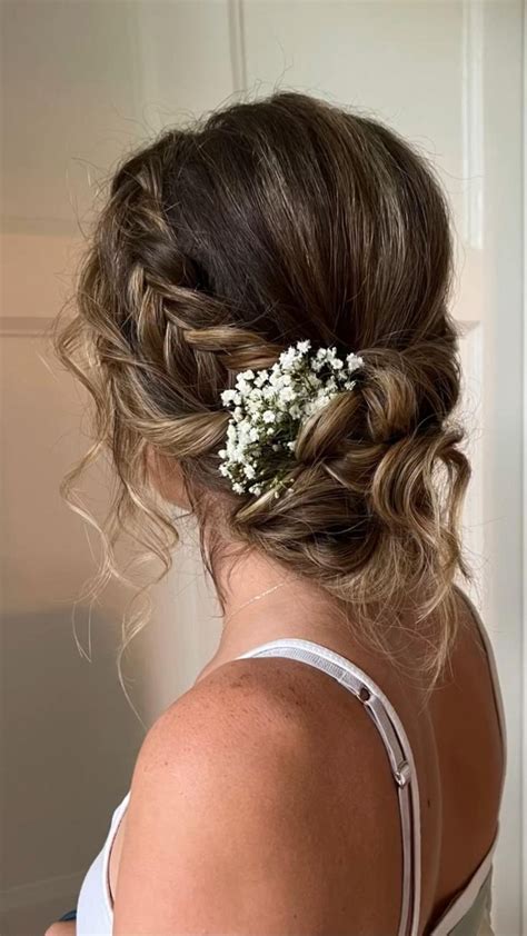 Wedding hair braided bun #weddinghair #bridalhair #bridesmaidhair #lowbun #weddinghairidea ...