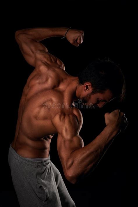 Strong Fitness Male Showing His Back Muscles Stock Image - Image of ...