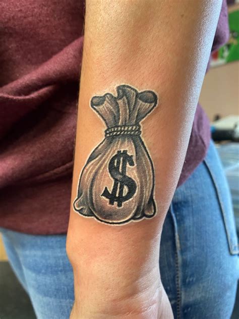 Money bag tattoo | Money bag tattoo, Money tattoo, Hand tattoos