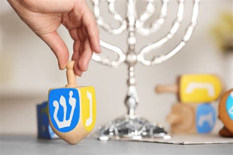 How to play dreidel: Rules, letter meanings, Hanukkah symbolism and more