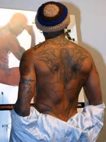 Dear goodness! See the tattoo Dennis Rodman has on his back | Bremen