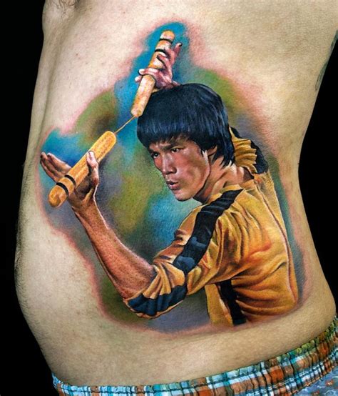 Bruce Lee color portrait tattoo by Cecil Porter: TattooNOW