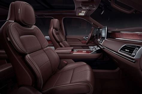 The front interior of a Lincoln Black Label Navigator Destination model is shown adorned with ...