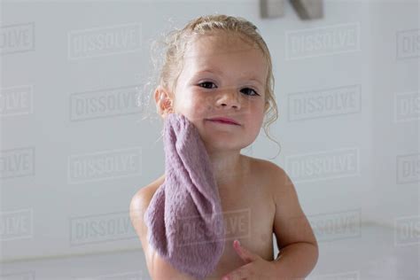 Little girl taking bath - Stock Photo - Dissolve