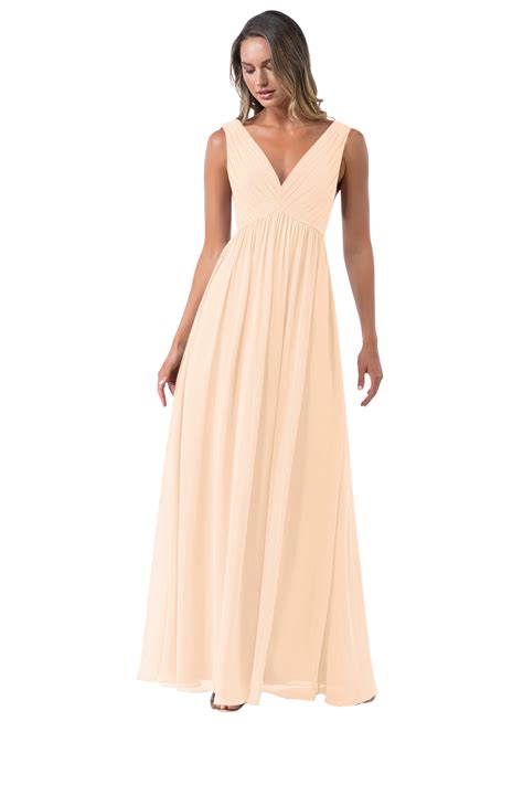 Ranvie is a chiffon A-line bridesmaid dress. She features a pleated V ...