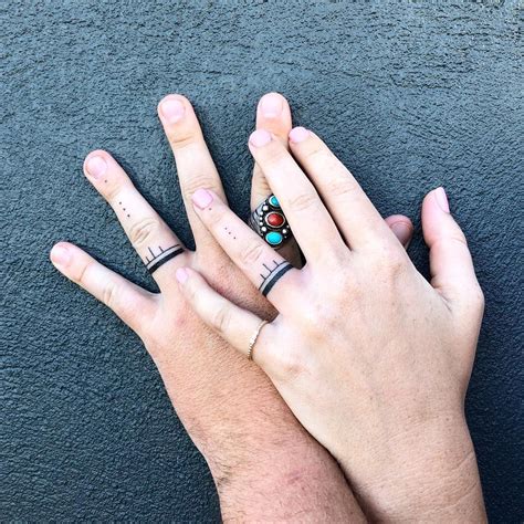 Wedding Ring Tattoos: Full-Finger Ring Tattoo. A double banded ring ...