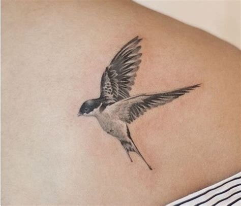 Realistic Flying Bird Tattoo