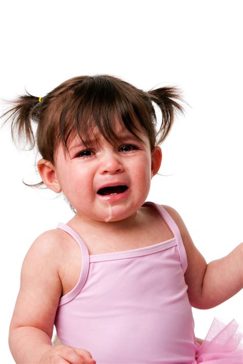 Cranky sad crying baby toddler face