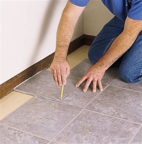 How to Lay a Vinyl Tile Floor | Vinyl tile flooring, Laying vinyl ...