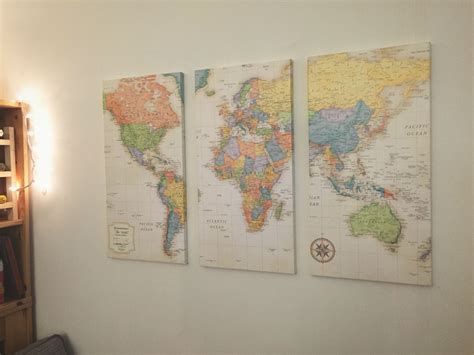 DIY World map canvas art. Found the 50x32 world map at OfficeMax and used 3 12x24 canvases. 😊 ...