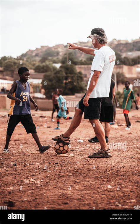 Mali, Africa - Black african children playing soccer with caucasian ...