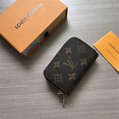 Louis Vuitton Multifunctional double pull key Wallet 10.5 cm | Key wallet, Wallet, Luxury wallet