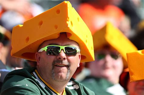 Why do Green Bay Packers fans wear cheese hats?