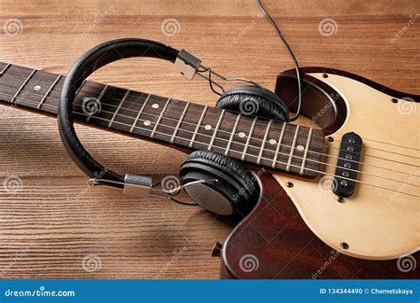 Modern Electric Guitar with Headphones Stock Photo - Image of musician, amplified: 134344490