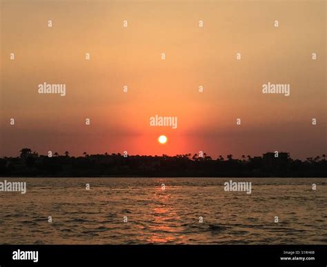 Nile river sunset Stock Photo - Alamy