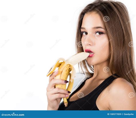 Young Beautiful Woman Eating Banana on White Background Stock Image - Image of hand, food: 100577859