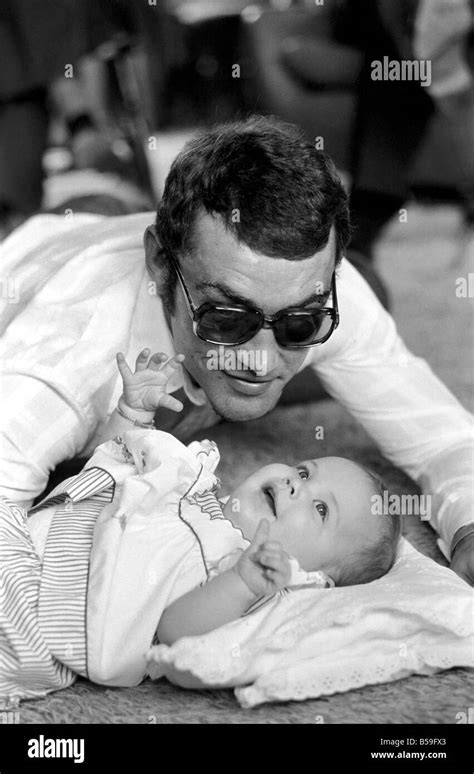 Boxer Alan Minter pictured at his Crawley Sussex home with his six month old baby daughter Kerry ...