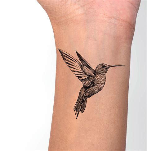 Hummingbird Tattoo Behind Ear