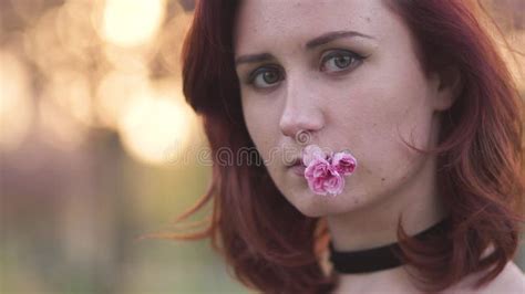 Face Portrait Close Up - Happy Young Travel Dancer Woman Enjoying Free Time in a Sakura Cherry ...