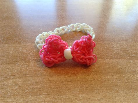 Rainbow loom bow | Rainbow loom patterns, Rainbow loom creations ...