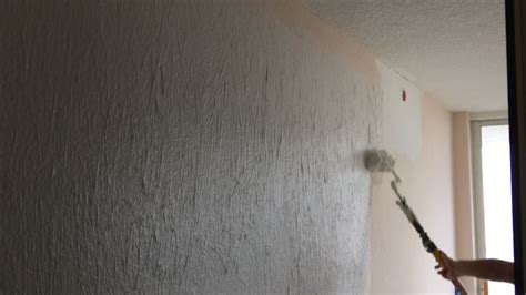 How to skim coat dtywall with the paint roller method | Paint roller, Painting over wallpaper ...