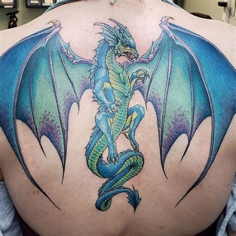 Blue dragon tattoo | Dragon tattoo back, Dragon tattoo colour, Blue dragon tattoo