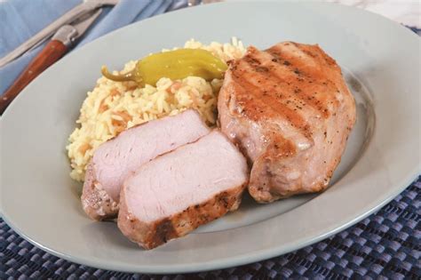 Pork Chops with Rice Pilaf - Prepared Food Photos, Inc.