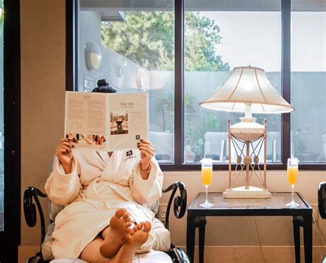 resort guest reading treatments and services of the spa in 2020 | Napa valley spa, Destination ...