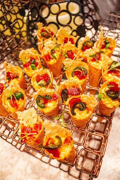 small appetizers are arranged on a cooling rack