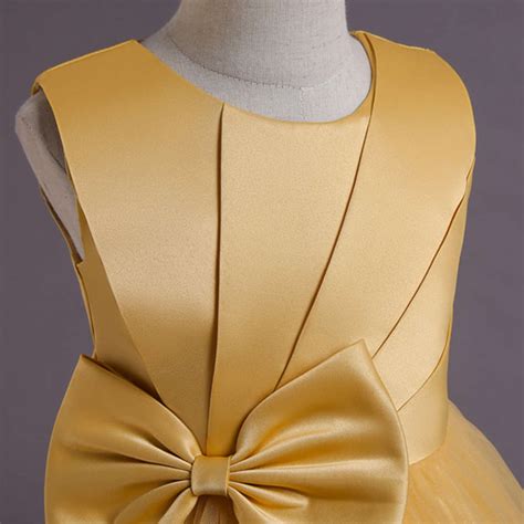 Shop Online Girls Yellow Bow Applique Party Dress at ₹1564