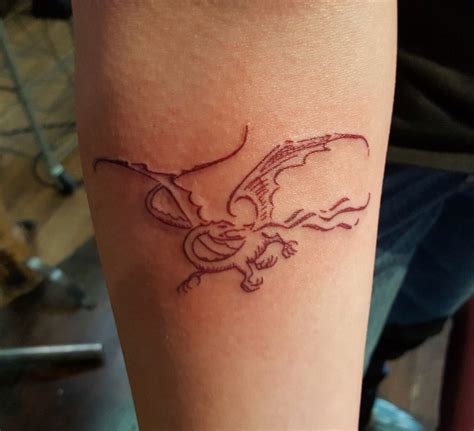 Smaug tattoo #lotr #dragon #tattoo #geek Smaug Tattoo, Hobbit Tattoo, Tolkien Tattoo, Ring ...